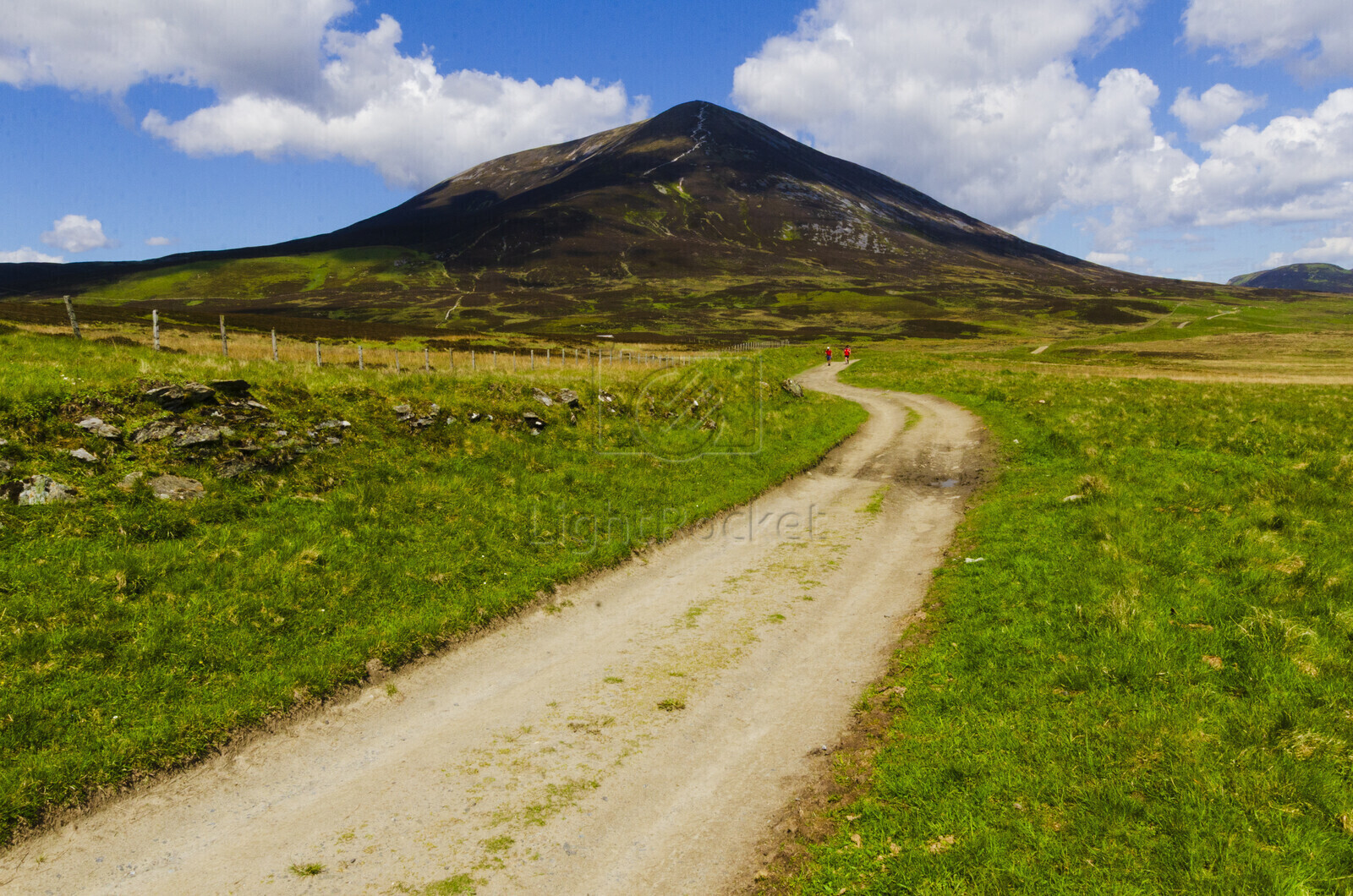 The estate road through Glen Tilt with the peak of Carn Liath on the left in the Cairngorms National Park near Blair Atholl, Perthshire in the Scottish Highlands of Scotland UK