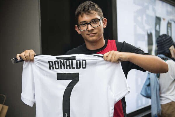 Fans Juventus with Ronaldo's Shirt in Turin